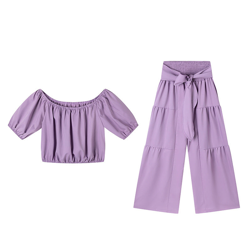 High-waisted Solid-color Flared Pants With Tie Detailing And A Flowing Drape