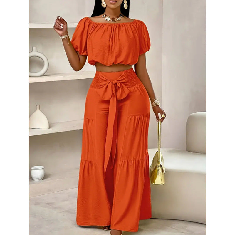 High-waisted Solid-color Flared Pants With Tie Detailing And A Flowing Drape
